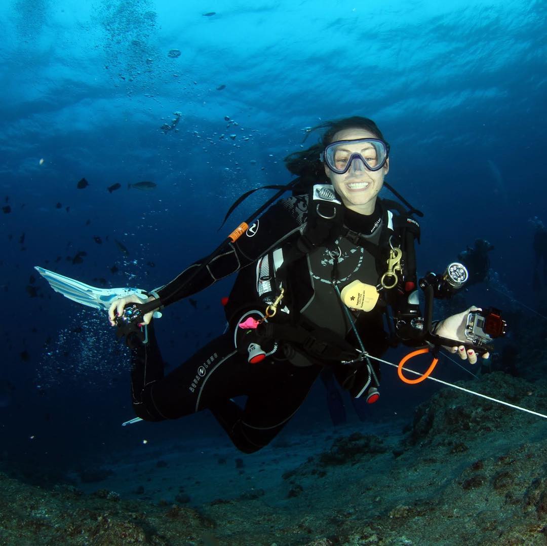 scuba diver smiling underwater